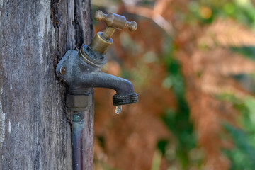 Leaking tap, water resource security use conservation waste, outdoor garden maintenance