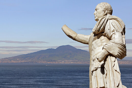 Roman  Statue of Proconsul Marcus Nonius and Vesuvius volcano ,Herculaneum near Naples, Italy