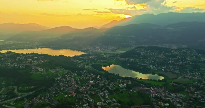 Aerial view of Lugano city and lugano lake from San Salvatore mountain. Aerial footage of the Monte Bre overlooking the city of Lugano in Canton Ticino in Switzerland