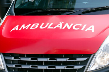 closeup of generic ambulance car description - in portuguese: ambulancia