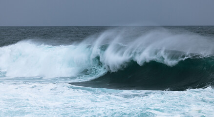 Fototapeta premium Azure Wave Breaking, Orkney, Scotland 