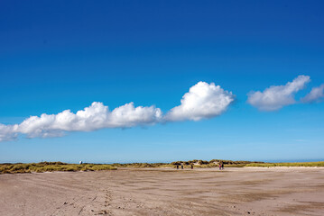 sand dunes and clouds