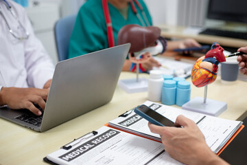 Businessman shaking hands with doctor in conference room Doctor and pharmacist shaking hands in medical office Salesman with new medicines shaking hands in hospital with medical team