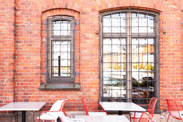red brick wall with windows