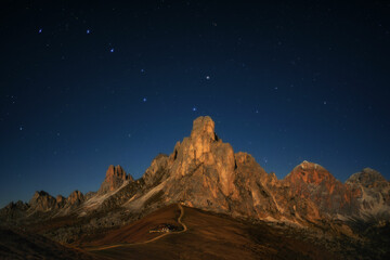 View from Passo Giau to Mount Gusela and Nuvolau at night with stars