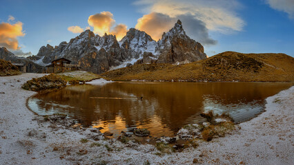 Passo Rolle with lake and Baita Segantini hut