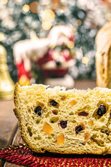 Sugar-free diet panettone, filled with candied fruit, slice of traditional Christmas & New Year baked Christmas cake.