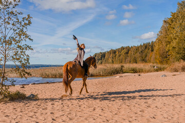 Stylish professional female jockey standing near horse. Friendship with horse. 