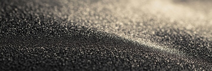 Grainy sandpaper surface showcasing intricate fine grit patterns, ideal for tactile design applications and material textures