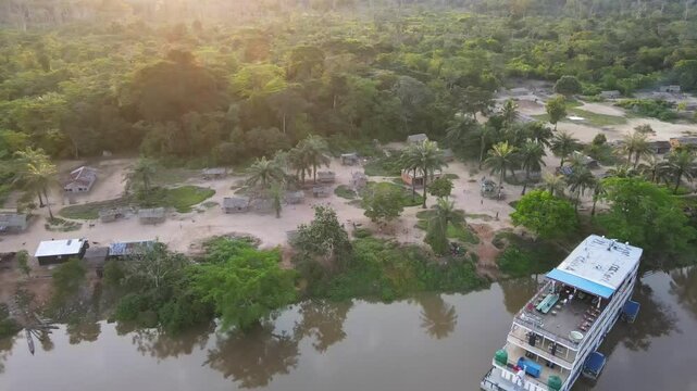 Aerial view of the congo basin rainforest, revealing the river running through it