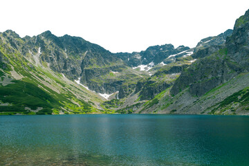 A beautiful mountain lake surrounded by rocks. Czarny Staw Gasienicowy. Isolated object. © bykot