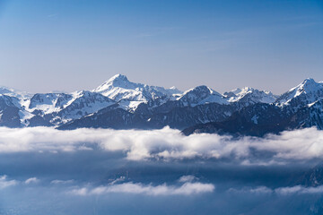 Obraz premium View on winter mpuntains from Rochers-de-Naye peak, Montreux, Alps.