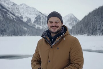 An isolated young man in nature on a snowy winter day