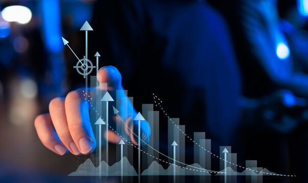 Businessman analyzing and calculating financial data for long term investment growth goals and company finance balance, Business strategy and planning