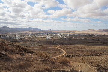 desertic landscape of volcano and caldera on the sea side