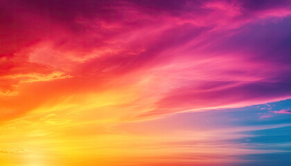 Obraz premium Vibrant sunset sky with hues of pink, orange, and blue, dramatic cloud formations.