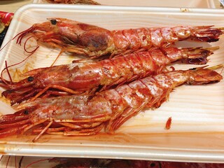 grilled shrimps on a plate at Osaka’s Kuromon Market 