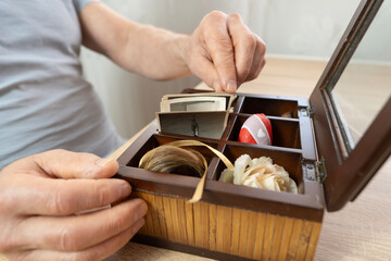 dear to heart memorabilia in old wooden box, seashells from past travels, vintage little gifts from...