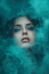 A mysterious portrait of a woman's ethereal face enveloped in swirling blue smoke, creating a dreamy effect.