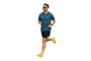 Man Jogging in a Park During Daytime Wearing Sunglasses and Athletic Wear While Enjoying Outdoor Exercise