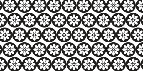 Simple and cool pattern with white floral motif and black circles