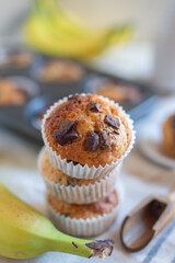 Banana chocolate chip muffins on a baking rack