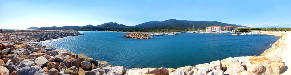 Panoramic view of the marina and the entrance to the port of Argeles-sur-mer, in the sunny south of France, between Perpignan (Pyrenees-Orientales) and the Spanish border, in the Occitanie region