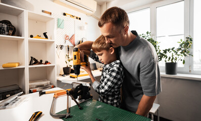 A Father and His Son Are Working Together on a DIY Project, Creating Memories and Skills