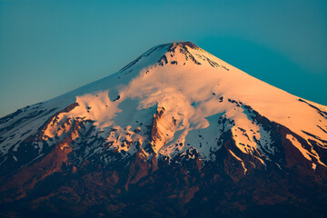 Close-up view of the summit of the Villarrica volcano at sunset.