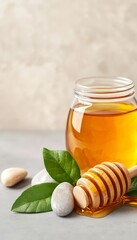 A soothing jar of honey beside smooth stones and fresh leaves, symbolizing natural sweetness and wellness.