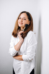 portrait of makeup artist on white background