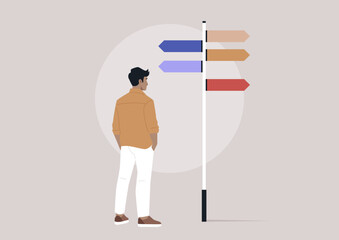 A figure stands thoughtfully at a vibrant signpost with multiple arrows, reflecting on various paths and possibilities, The backdrop suggests a contemporary, minimalistic setting © nadia_snopek