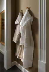 Bathrobes hanging on the wall