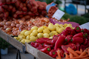 Fresh vegetables displayed on a farmer's market counter