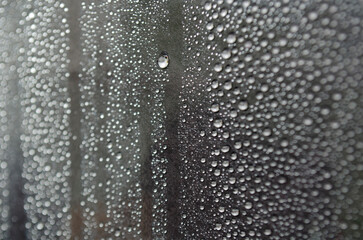 Small rain droplets on dark cover background. Suitable for wallpaper background