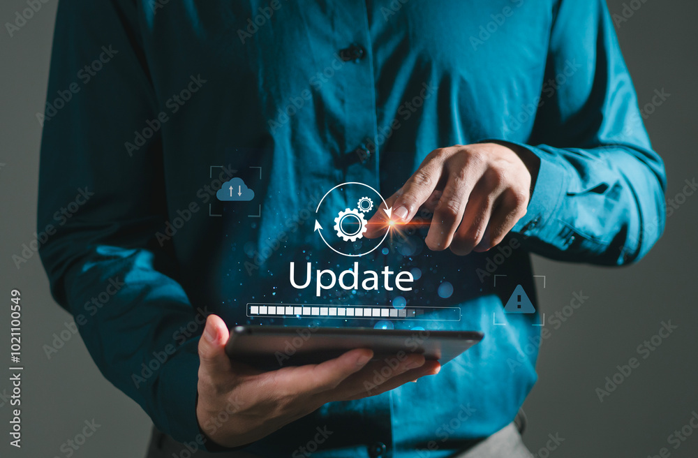 Wall mural man using laptop with update software. business technology upgrade. internet. update on virtual scre