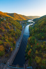 mountain river at sunrise. landscape of romania in autumn. somes river in apuseni mountains in fall season. beautiful scenery of european countryside. winding water stream