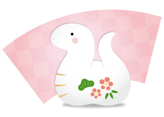 へびの置物と扇子背景の年賀状素材