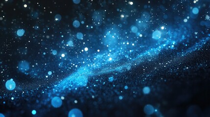 A mesmerizing abstract image of shimmering blue particles creating a cosmic atmosphere.