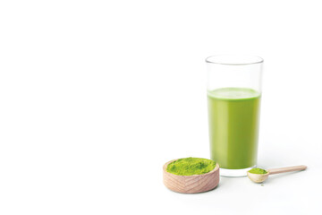 Glass with fresh wheatgrass juice on white background copy space