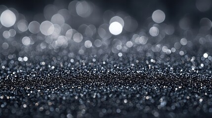 A shimmering surface adorned with glistening silver and blue bokeh lights creates a magical atmosphere.