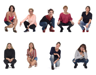 Fototapeta premium group of women squatting on white background