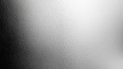 Abstract close-up of a textured glass surface with a gradient effect, creating a soft, diffused light.