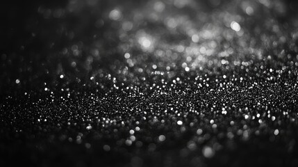 Abstract close-up of sparkling water droplets on a dark surface, creating a mysterious and enchanting atmosphere.