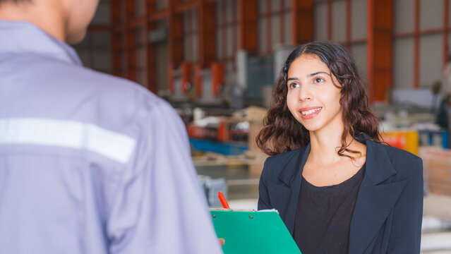 Close up Female manager or professional entrepreneur is interview or discussion with engineer in industry or factory, concept on side occupation or job interview, human resources find colleague.