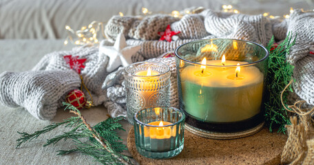 Cozy Christmas composition with candles. Christmas concept.
