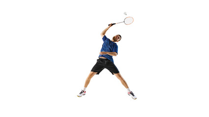 Athletic man, badminton player poised to strike, showcasing agility and dynamic motion against...