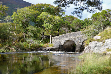 old stone bridge over the river