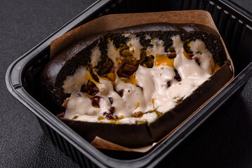 Sandwich with brioche bun, roast beef and vitello tonato sauce