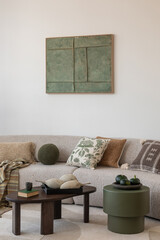 Elegant neutral tones. A chic living room featuring neutral-colored furniture and decor with soft...